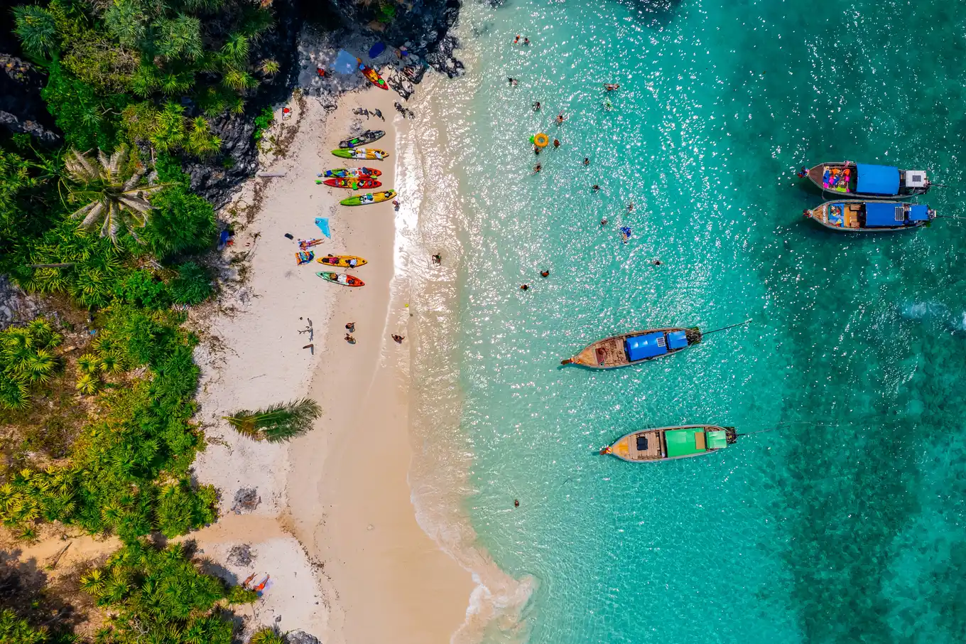 Nui beach and long tail boat in Krabi, Thailand