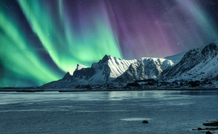 Aurora Borealis, Northern Lights Above of snowy mountain in Lofoten Islands