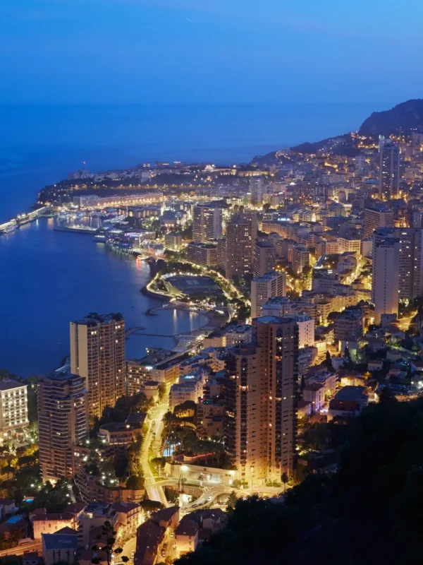 Montecarlo, illuminated city view in the evening, Monaco, Cote d'Azur
