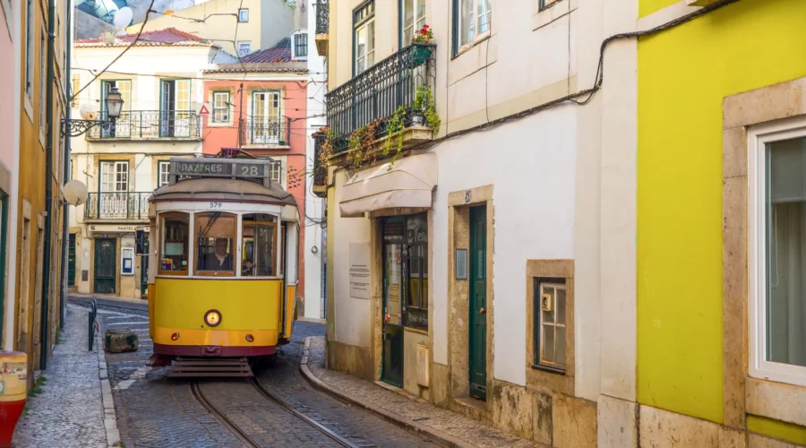 Vintage tram in a charming old Lisbon street