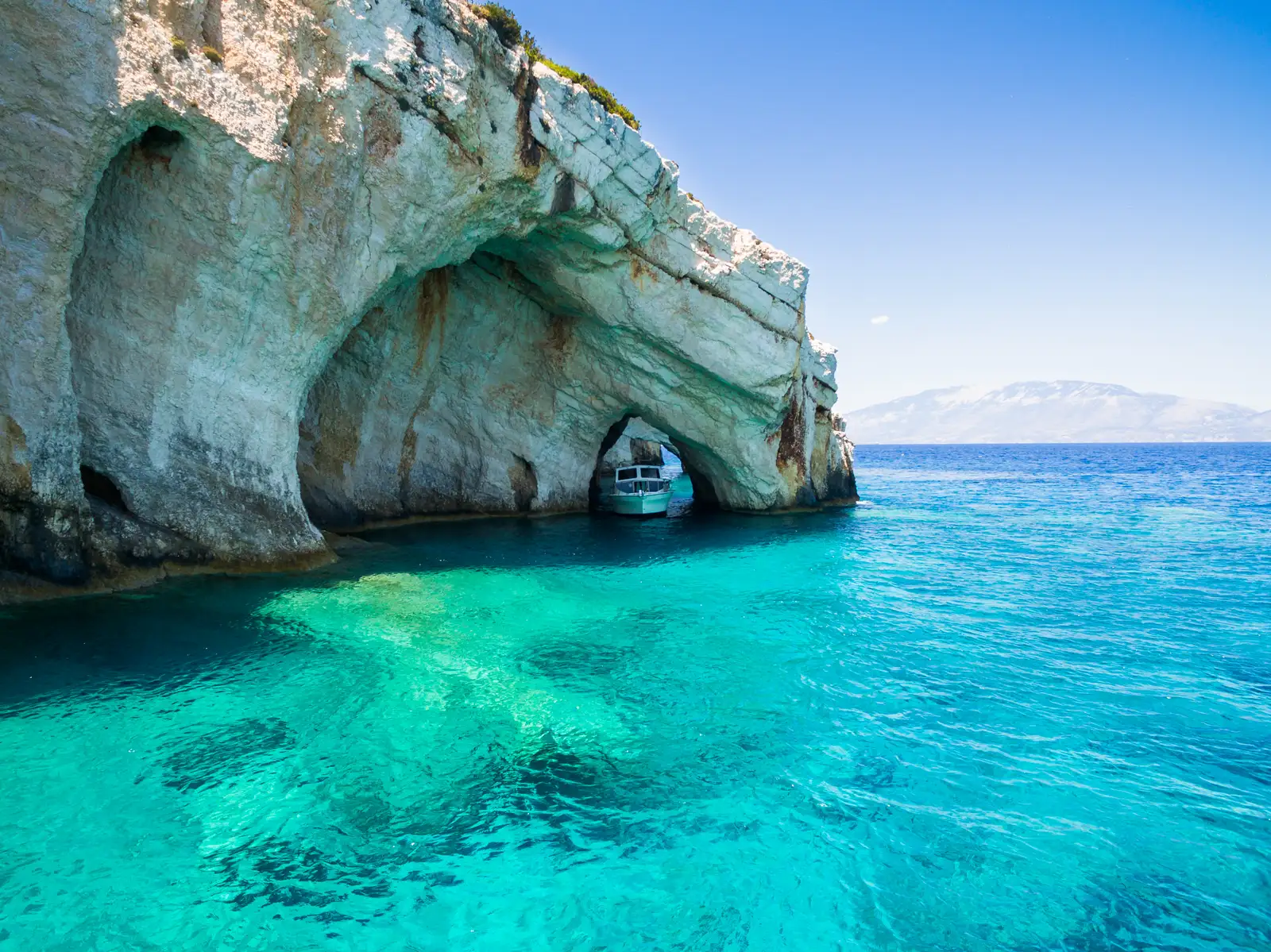 Aerial view of Agios Nikolaos blue caves in Zakynthos, Greece